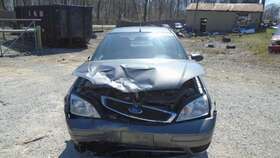 5s4z5560ha Ford 05 06 07 Focus Rear Coil Spring 4dr Without Stabilizer