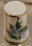 Thimble Collectors Club, The Blossoms Of Spring By Royal Grafton, England. Fixed Price $5.84.