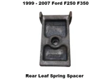 2C34-5594-AA 1999 To 2007 F250 F350 Rear Auxiliary Leaf Spring U-bolt Spacer. Fixed Price $35.00.