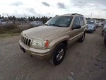 Air/coil Spring Front Fits 99-04 Grand Cherokee 12198837. Fixed Price $70.02.