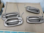 1999-2006 Tahoe Suburban Yukon Door Handle Set 4 Paint Code U711 Met Gm. Fixed Price $80.00.